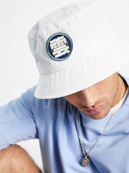 ASOS DESIGN bucket hat in white with patch 