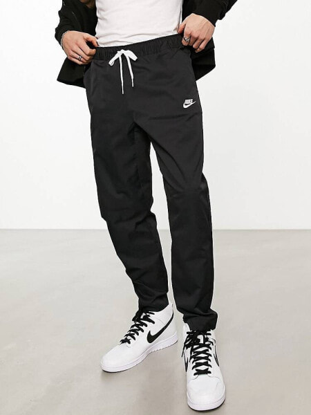 Nike Club woven tapered trousers in black