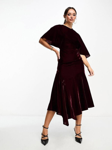 ASOS DESIGN velvet flutter sleeve asymmetric hem midi dress in burgundy