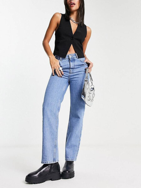 Reclaimed Vintage 90's high waisted slim leg jean in antique wash