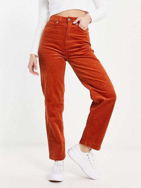 Monki slim leg corduroy trousers in rust