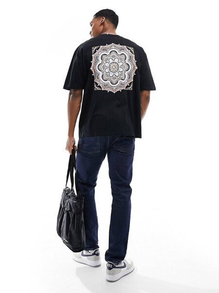 ASOS DESIGN oversized t-shirt in black with paisley back print