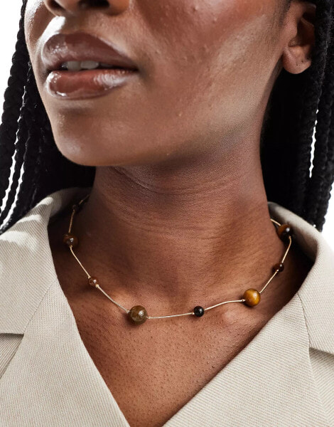 ASOS DESIGN short necklace with mixed sized tigers eye real semi precious stone in gold tone