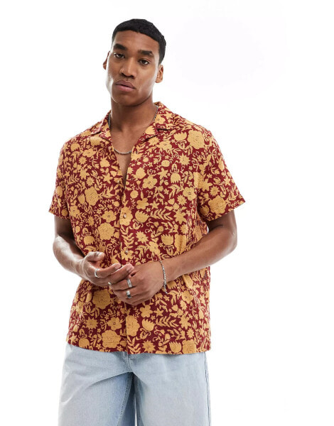 ASOS DESIGN relaxed revere textured shirt in orange and red floral print