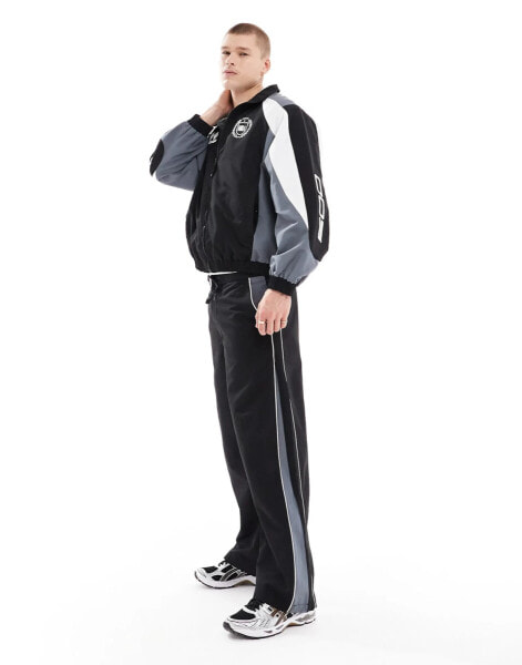 Bershka sporty panel tracksuit pants in black