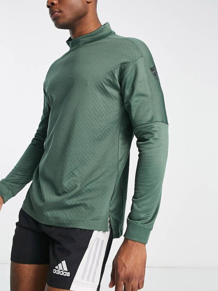 Спортивный свитшот Adidas Training Strength Warm в зеленом цвете с высоким воротником