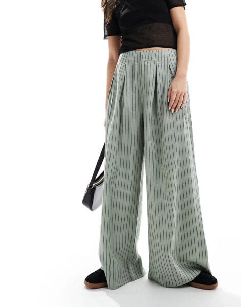 ASOS DESIGN wide leg trouser with pleat detail in sage stripe