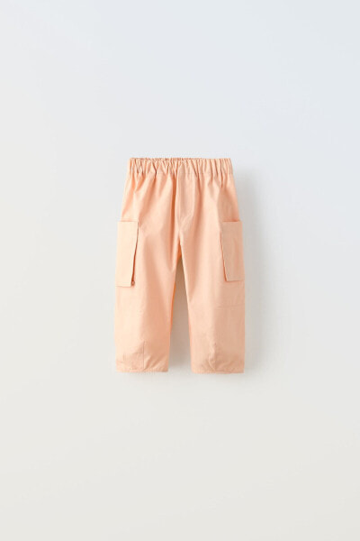 Poplin trousers with embroidered pockets