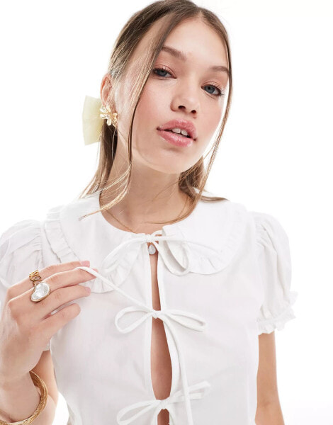 Bershka poplin peplum tie detail top in white