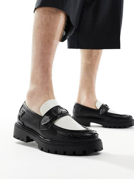 ASOS DESIGN chunky loafers in black and white faux leather with western details