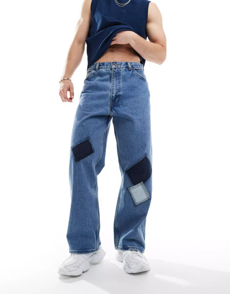 Levi's Skate crop carpenter fit jeans in blue with patchwork