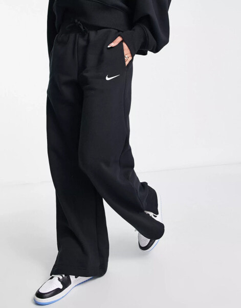 Nike mini swoosh high rise wide leg joggers in black and sail