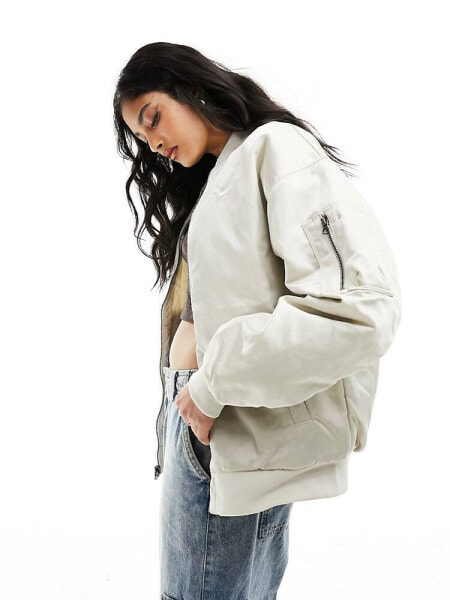 Nike mini swoosh varsity bomber jacket in light orewood brown