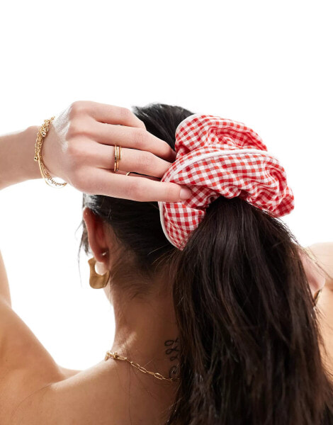 ASOS DESIGN scrunchie hair band with oversized gingham design in red