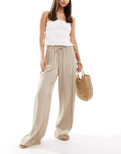 Vila weighted plisse satin feel wide leg trousers in beige