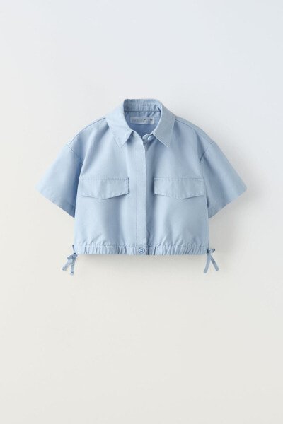 Technical shirt with bows