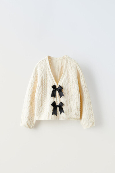 Knit cardigan with bows