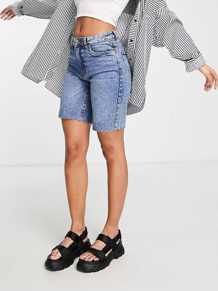 Vero Moda longline denim shorts with raw hem in light blue