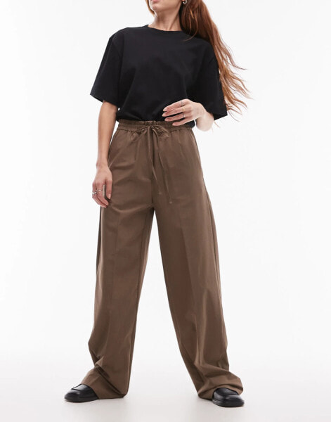 Mango elasticated tie waist relaxed trouser in brown