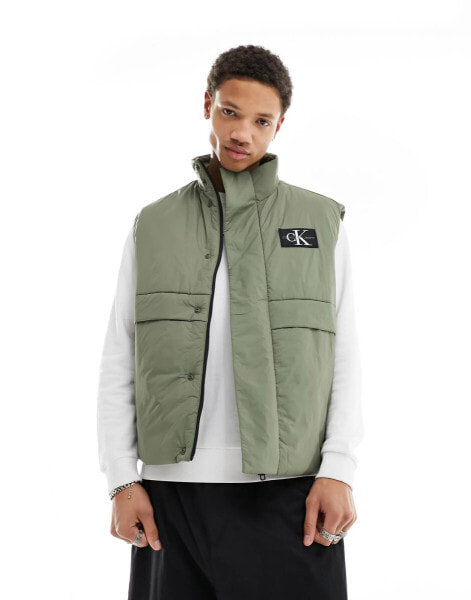 Calvin Klein Jeans transitional badge logo vest in olive