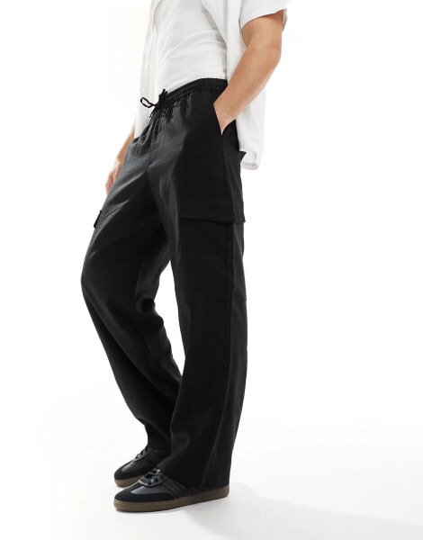 ADPT loose fit linen mix cargo trousers in black