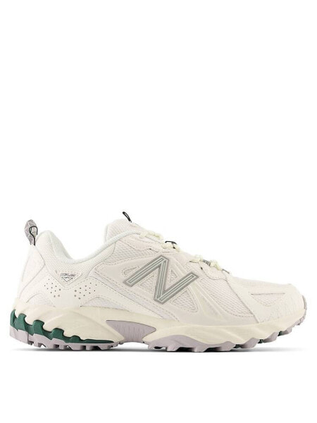 New Balance 610 trainers in white and green