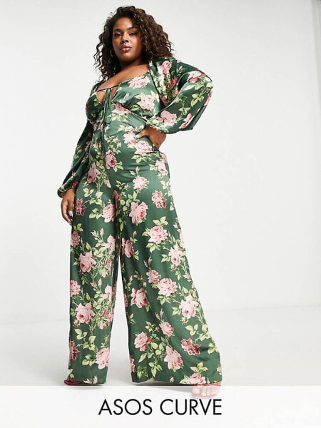 ASOS DESIGN Curve satin tea jumpsuit with lace up back in floral print