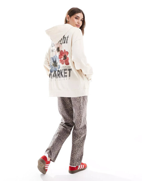 ASOS DESIGN – Oversize-Kapuzenpullover in Cremeweiß mit „Flower Market“-Grafikprint