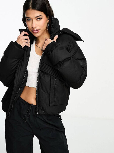 The Couture Club oversized cropped puffer jacket in black with tie hem 