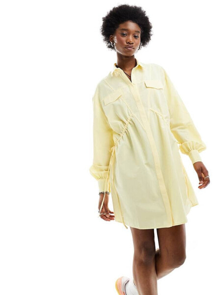 ASOS DEISGN mini shirt dress with ruched sides and pocket detail in buttermilk