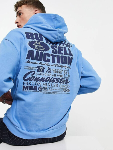 ASOS DESIGN oversized hoodie in blue with skate text back print