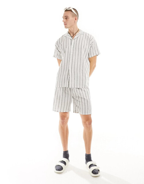 South Beach linen blend shorts in white with black stripe