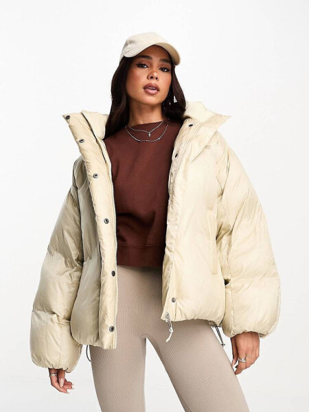 Levi's Down Bubble hooded puffer jacket in cream with logo