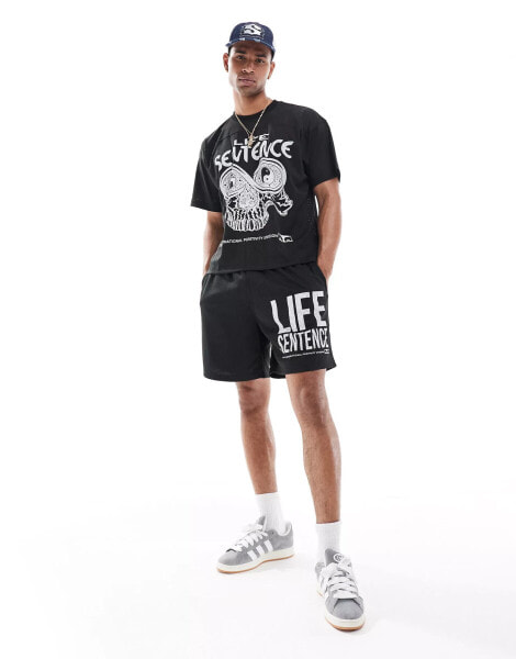 Obey co-ord graphic mesh shorts in black