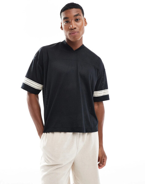 ASOS DESIGN oversized boxy t-shirt with sport inspired design in black mesh