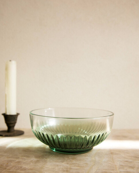 Glass bowl with raised design