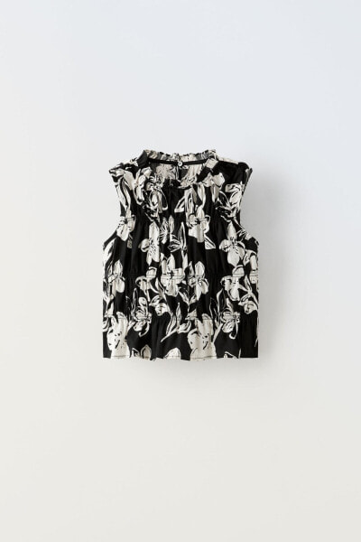 Блуза с цветочным принтом и эластичными деталями ZARA