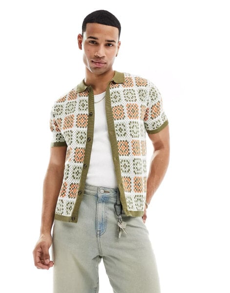 ASOS DESIGN knitted crochet button through polo in khaki and orange