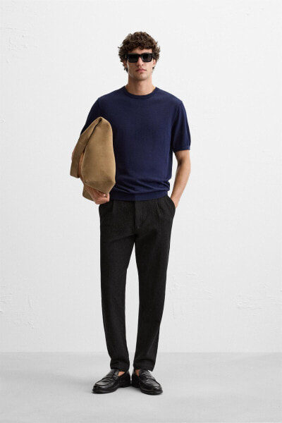 TEXTURED PLEATED TROUSERS