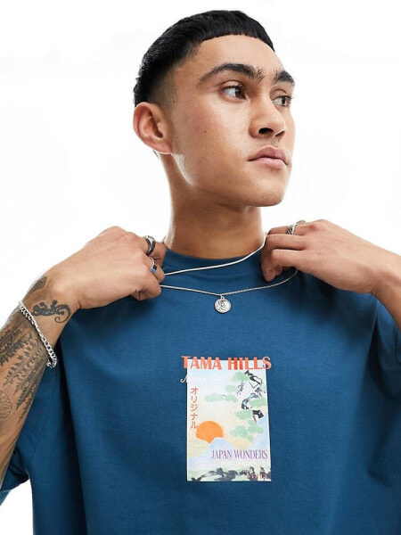 ASOS DESIGN oversized t-shirt in blue with scenic chest print