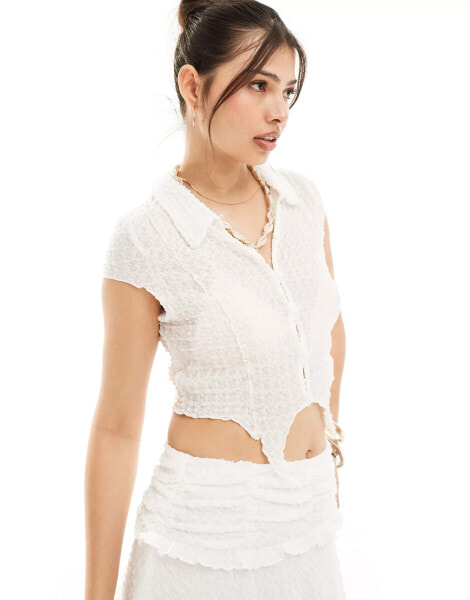 Something New X Cenit Nadir cap sleeved textured shirt co-ord with hem in white