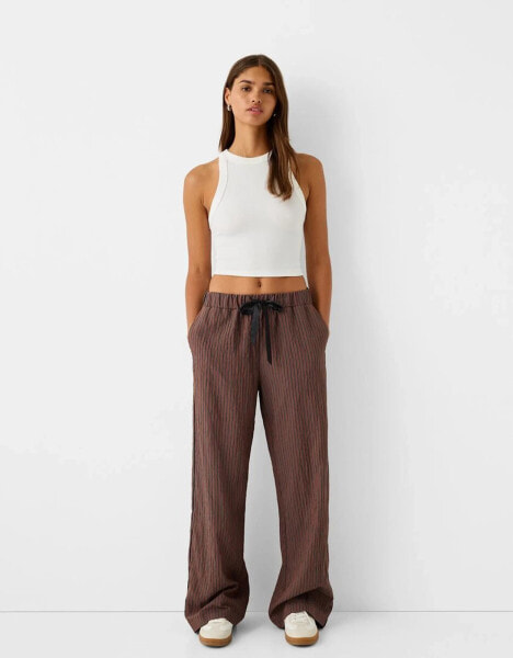 Bershka ribbon drawstring waist wide leg trousers in brown & stripe