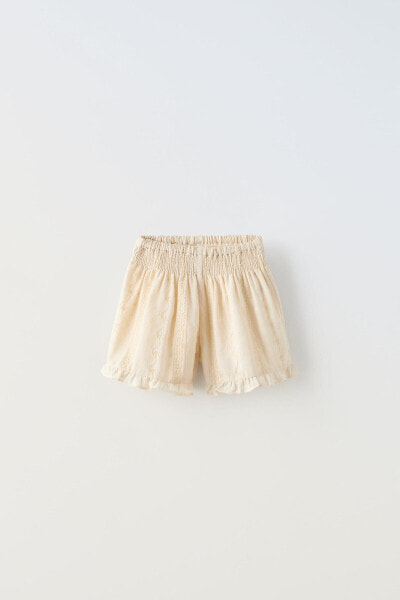 Embroidered dotted mesh bermuda shorts