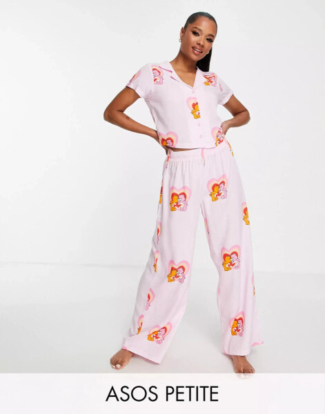 ASOS DESIGN Petite Care Bears modal shirt & trouser pyjama set in pink