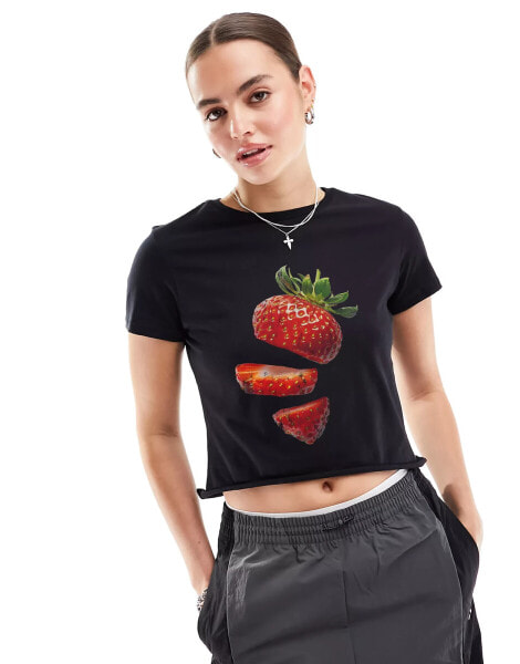 ASOS DESIGN baby tee with strawberry fruit graphic in black