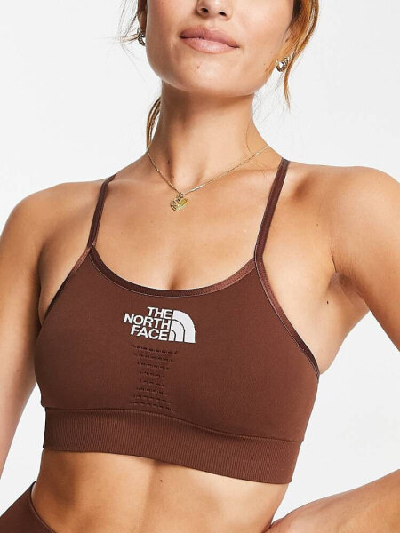 The North Face Training seamless performance sports bra in brown Exclusive at ASOS
