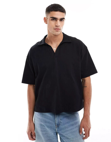 ASOS DESIGN oversized polo with revere collar in black