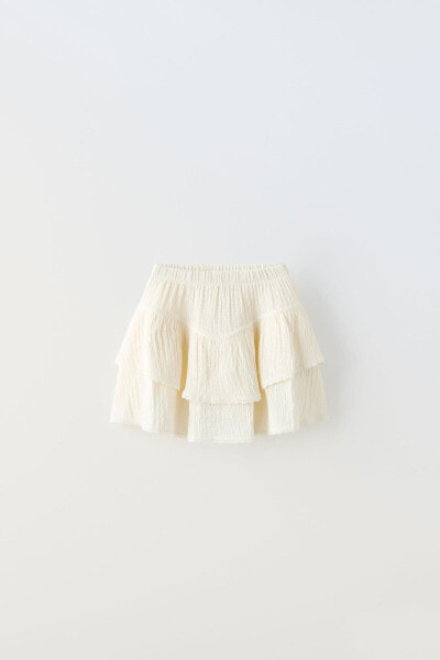 Textured skirt with lace trim