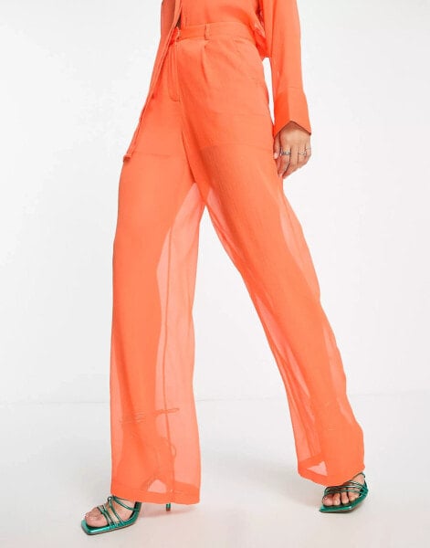 NA-KD – Hose aus transparentem Material in Orange mit weitem Bein, Kombiteil