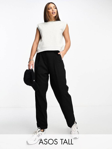 ASOS DESIGN Tall tapered trouser with turn up hem in black 